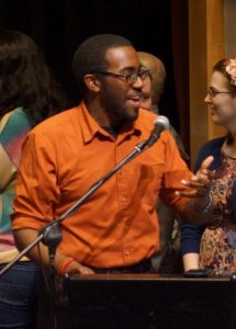 A man and woman talking to each other.