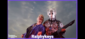 Four people singing outdoors in winter with songbooks.